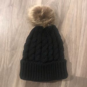 Black knit beanie with brown Pom Pom
